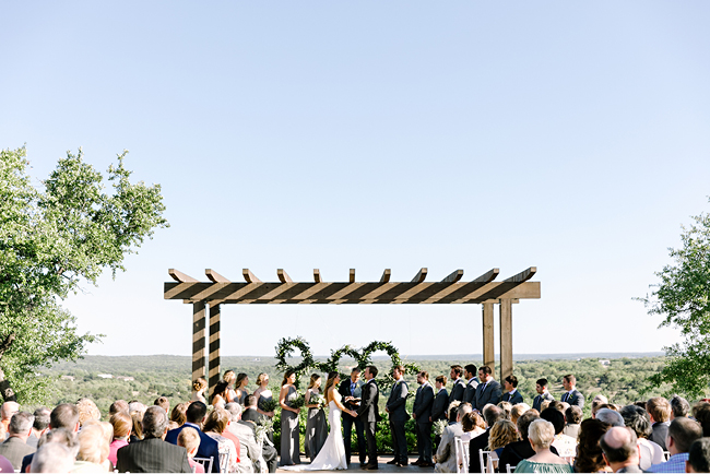 Outdoor wedding ceremony at Canyonwood Ridge, overlooking the Texas Hill Country