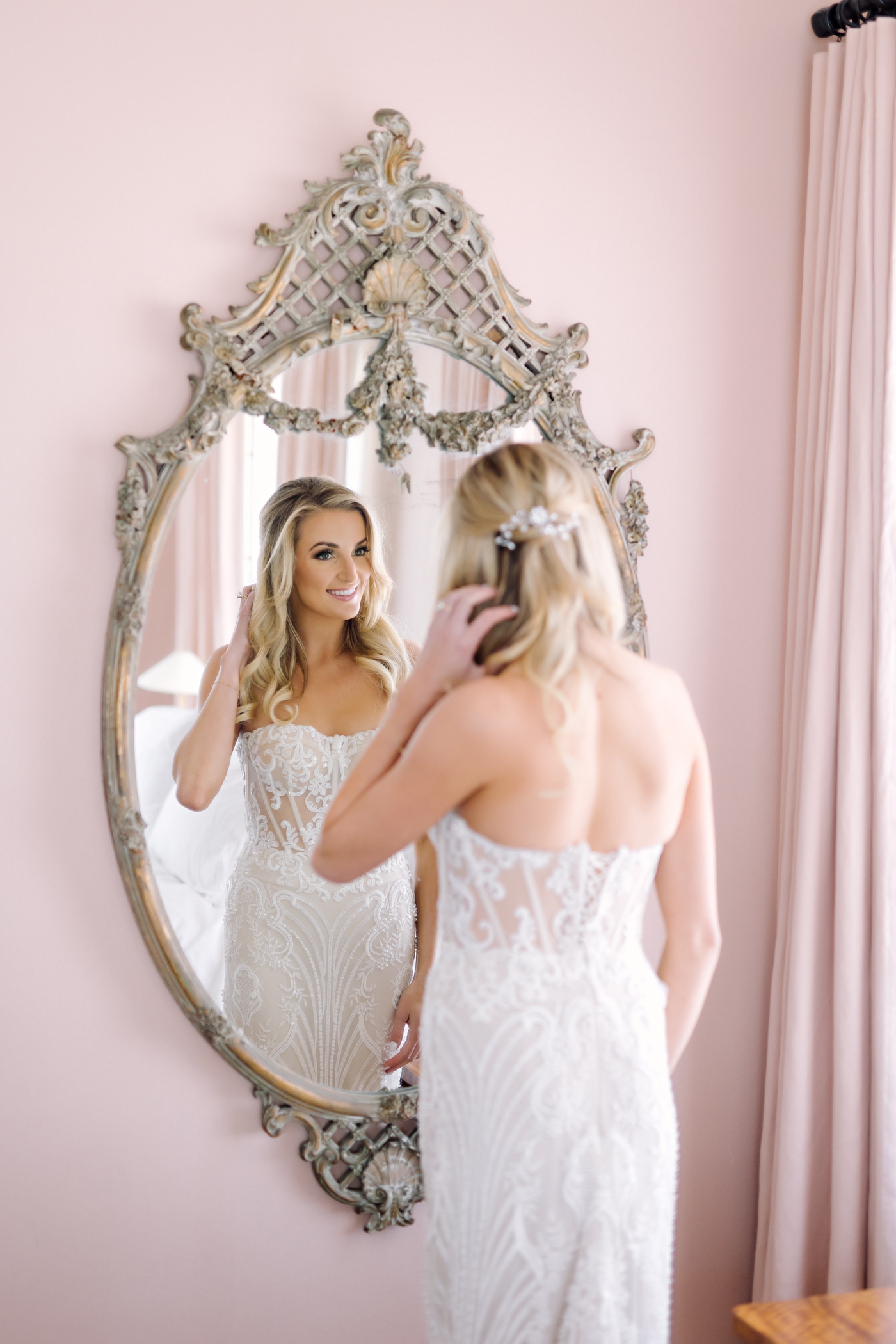 Bride in a lace gown by Adam Zohar
