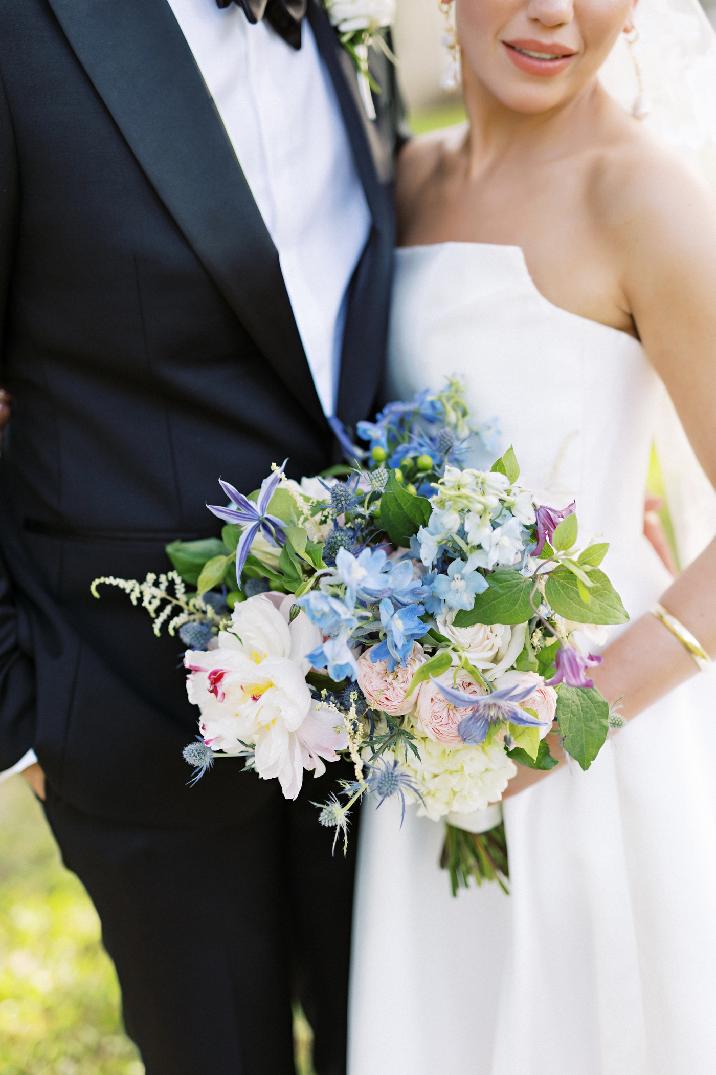Spring bridal bouquet with soft blue and blush