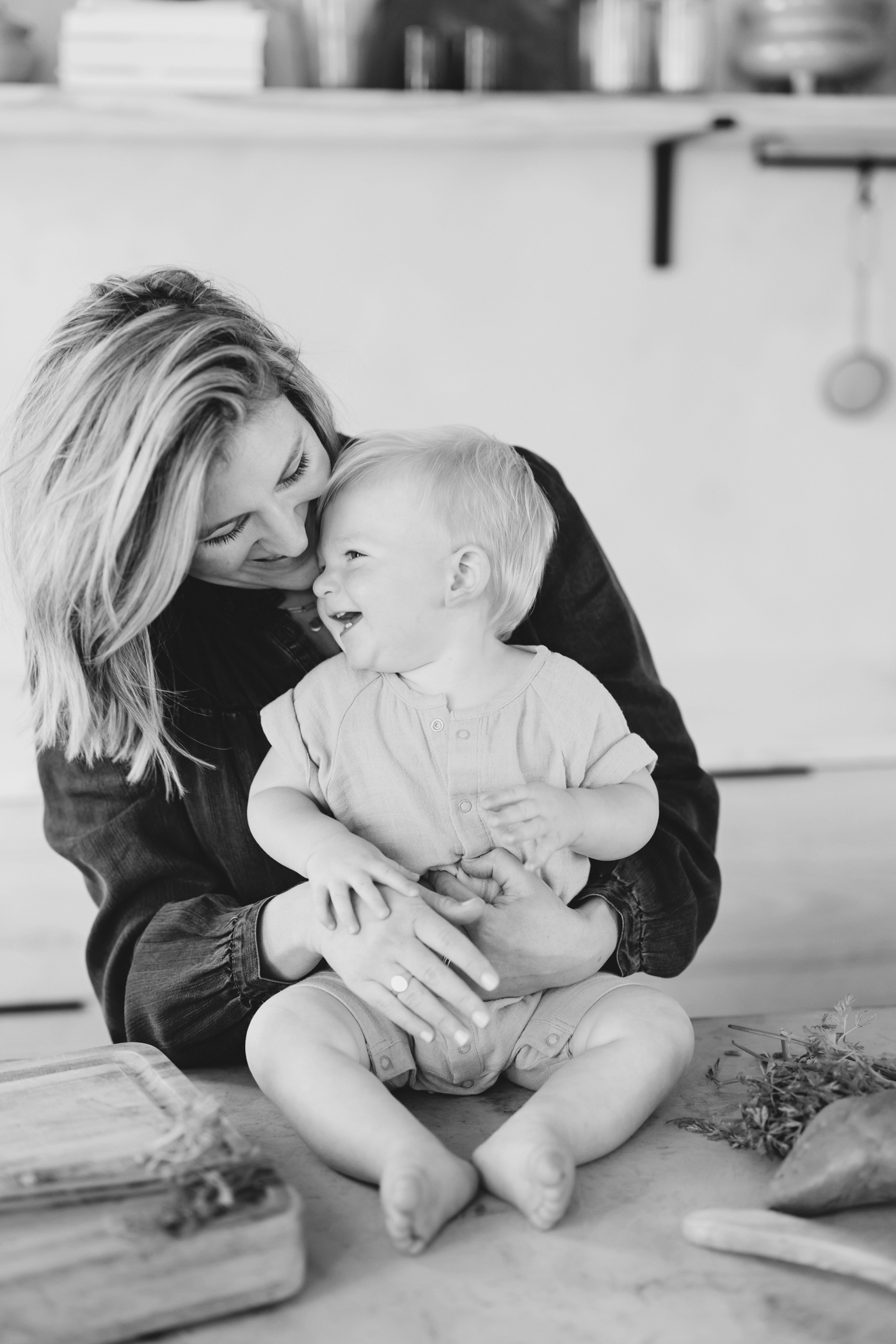 Black and white image of a mom and her son for a branding session