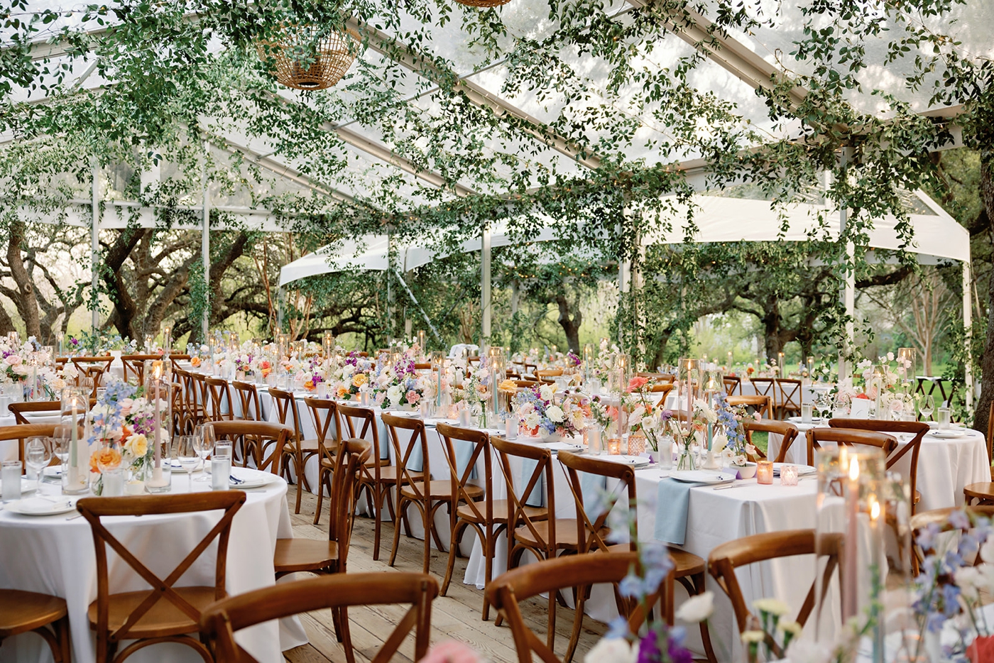 Hanging greenery at a tented wedding at Matties Green Pastures in Austin