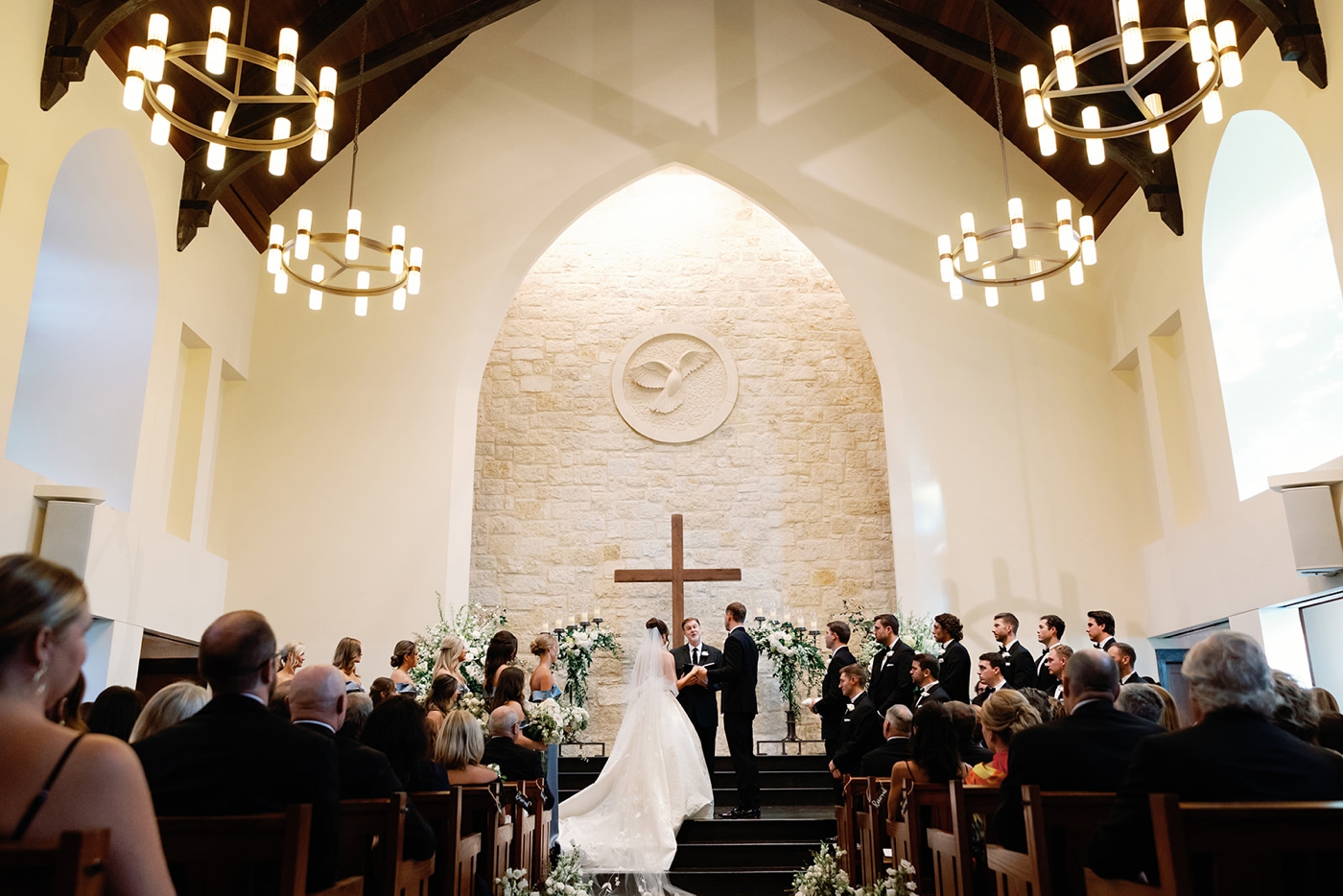 Wedding ceremony in the Smith Family Chapel at Riverbend Church in Austin, TX
