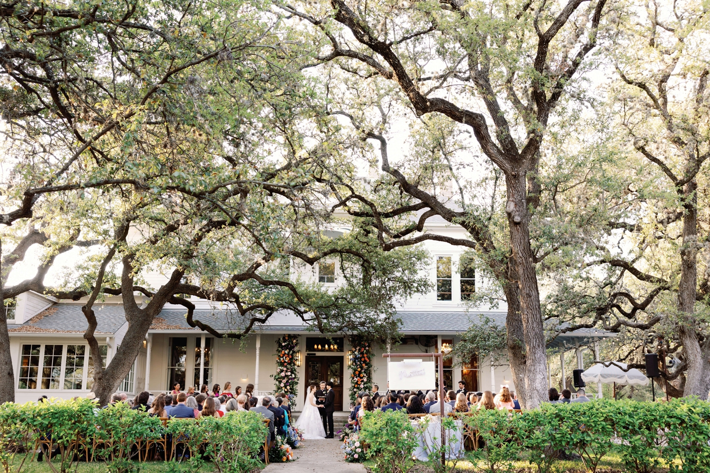 Outdoor wedding ceremony at Mattie's green pastures on the lawn