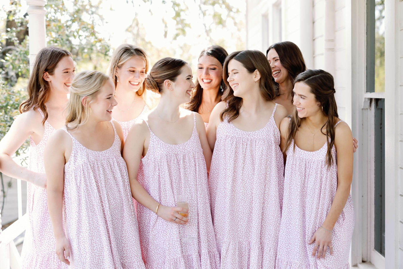 Bridal party in blush pink dresses getting ready for an Austin wedding