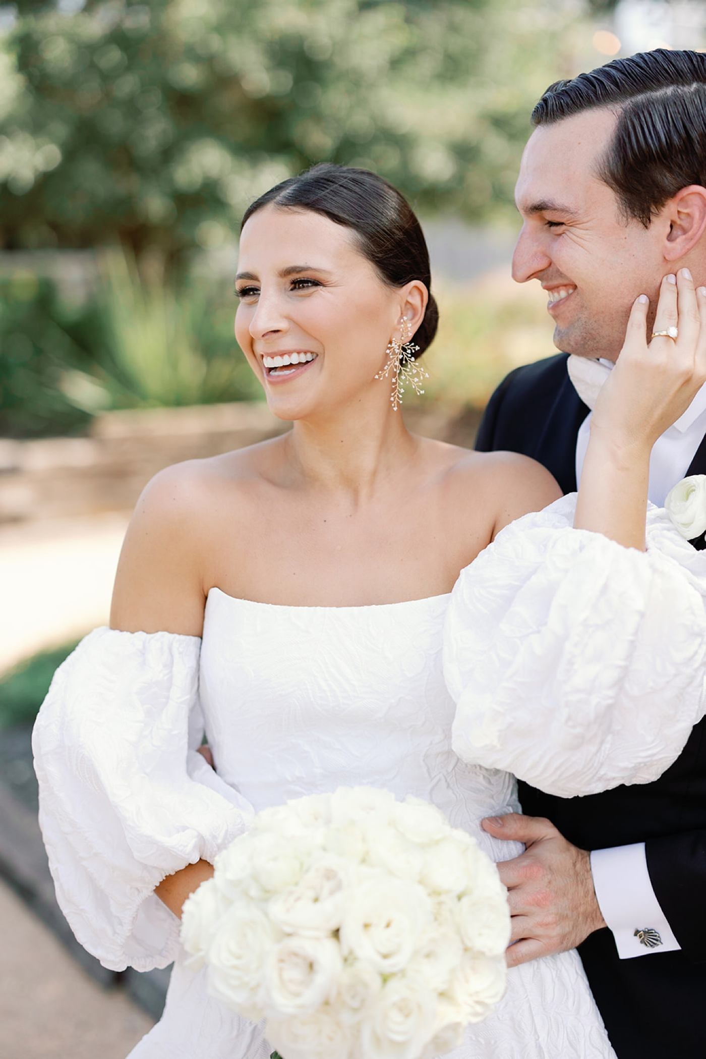 Bride in the Melrose gown by Lela Rose, an embroidered ballgown with puff sleeves