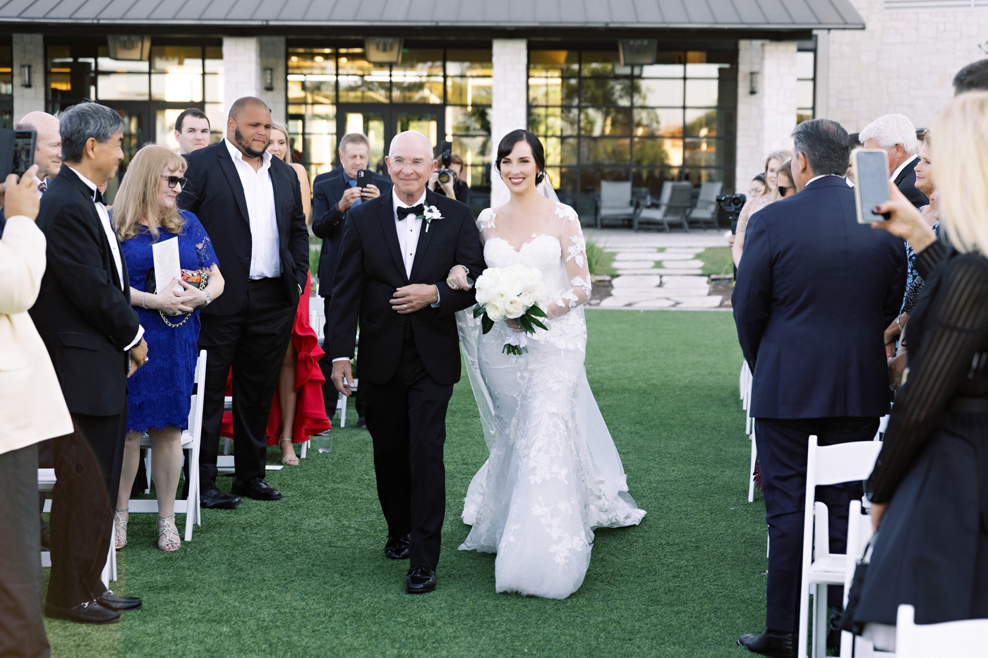 Bride walking down the aisle with her father