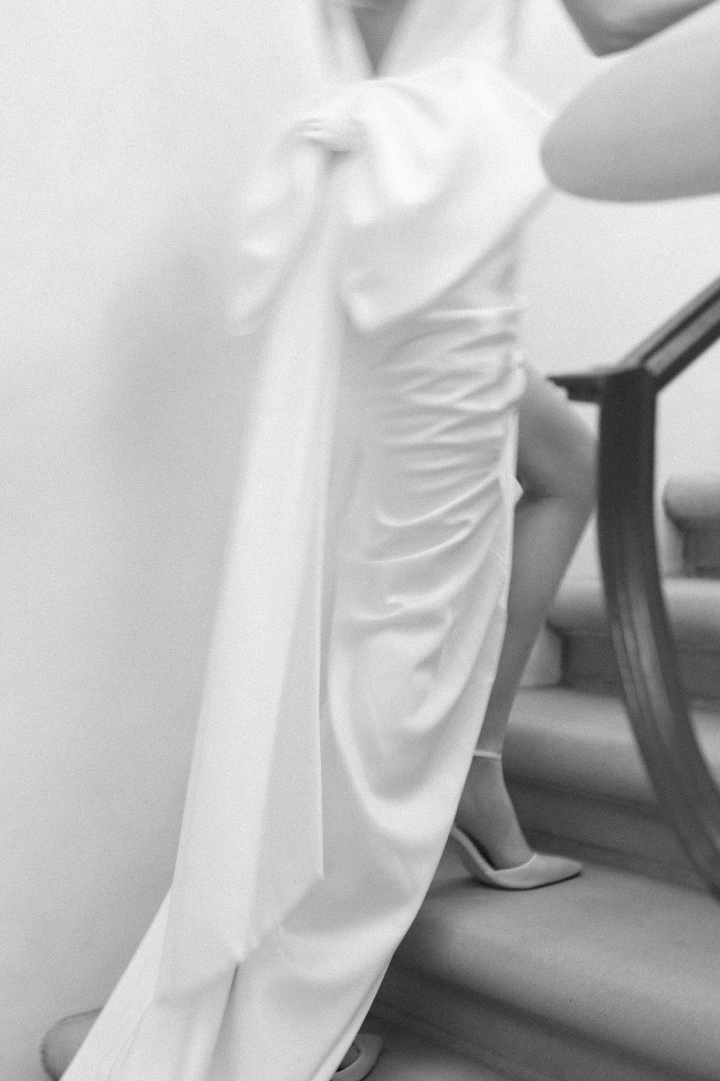 Downtown Austin engagement session in a garden, with the bride in a Halfpenny London Gown