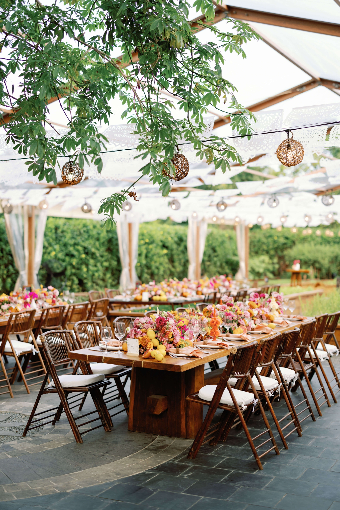 A tropical rehearsal dinner at La Ceiba Garden at Rosewood Mayakoba